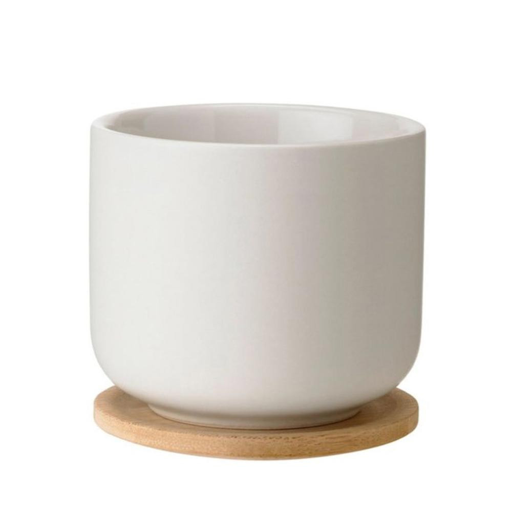 Ceramic kitchen utensil holder with cork mat