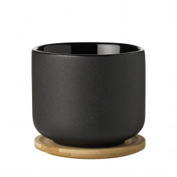 Ceramic kitchen utensil holder with cork mat