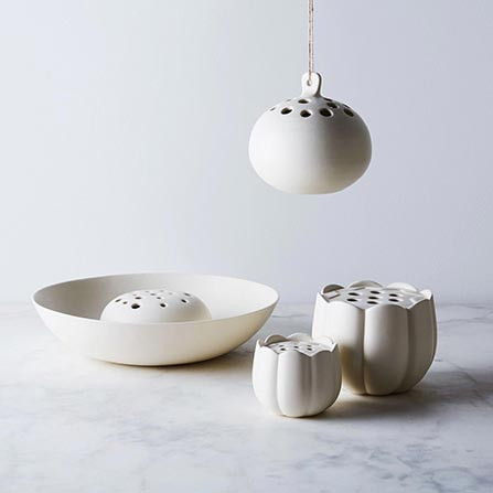 Charming ceramic hanging flower pots for elegant outdoor decor