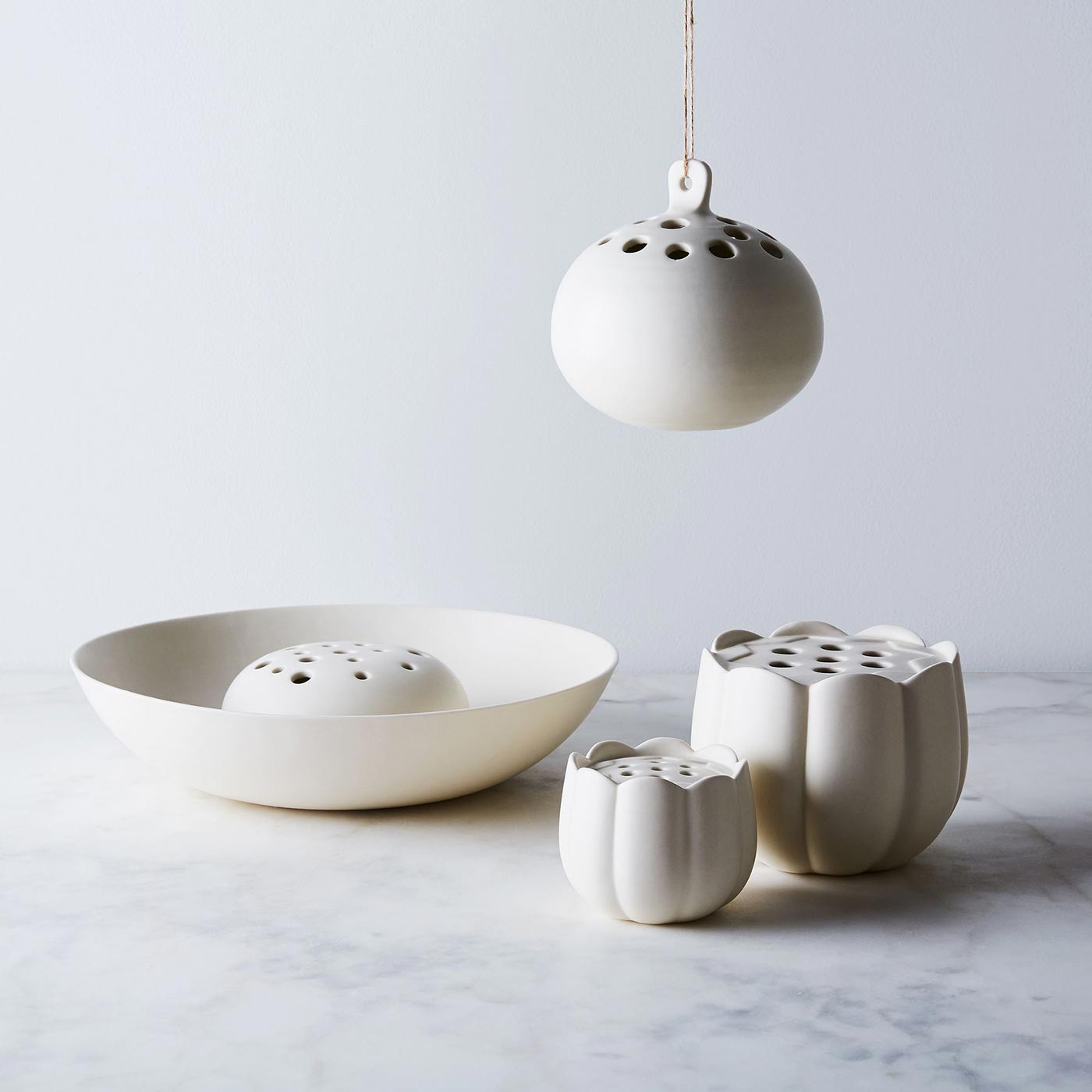 Charming ceramic hanging flower pots for elegant outdoor decor