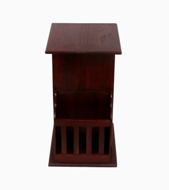 Dark wooden stool with magazine and pot holder