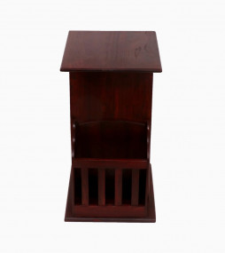 Dark wooden stool with magazine and pot holder