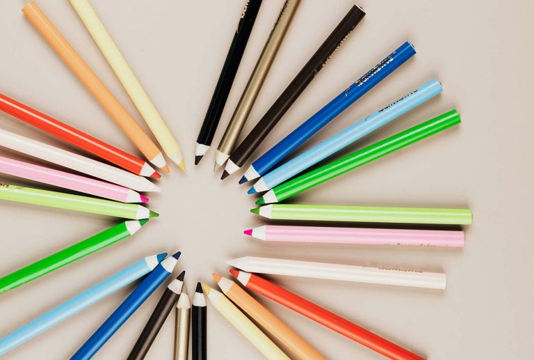 Children carry pencil boxes filled with useful stationery to school